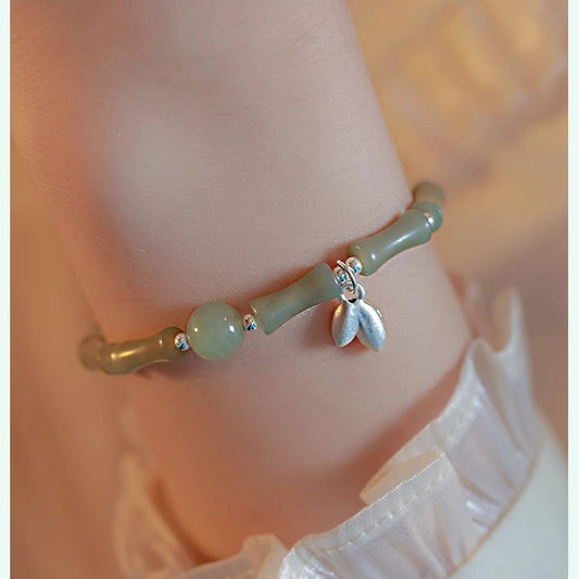 The Golden Ascent | Artisan Jade-Style Bamboo Bracelet with Prosperity Leaf Charm