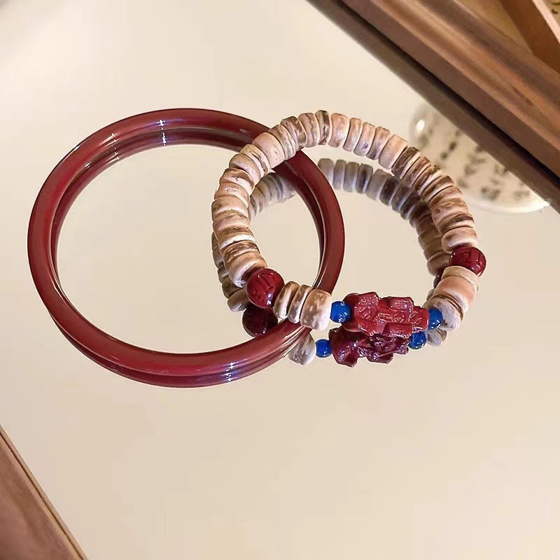 Earth & Ember Collection | Artisan Cinnabar Bangle & Hand-Carved Coconut Shell Pixiu Bracelet Set