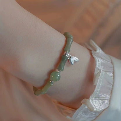 The Golden Ascent | Artisan Jade-Style Bamboo Bracelet with Prosperity Leaf Charm