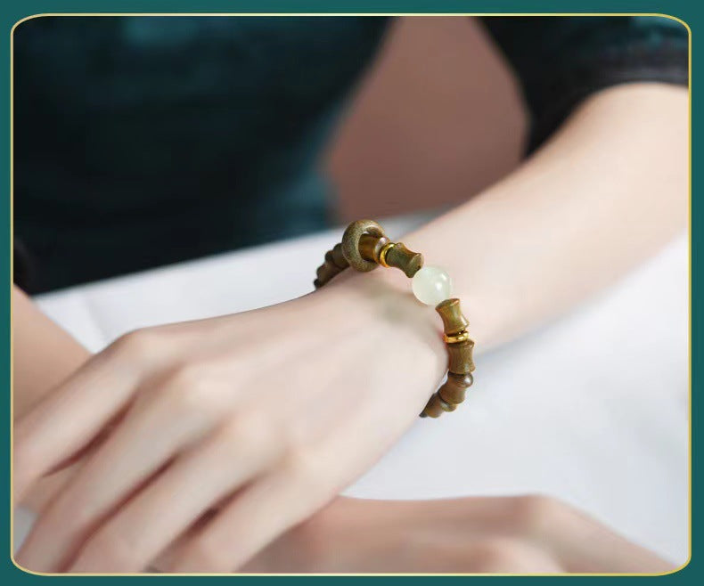 Zen Bamboo Rises Bracelet | Natural Green Sandalwood & Luminous Peace Bead