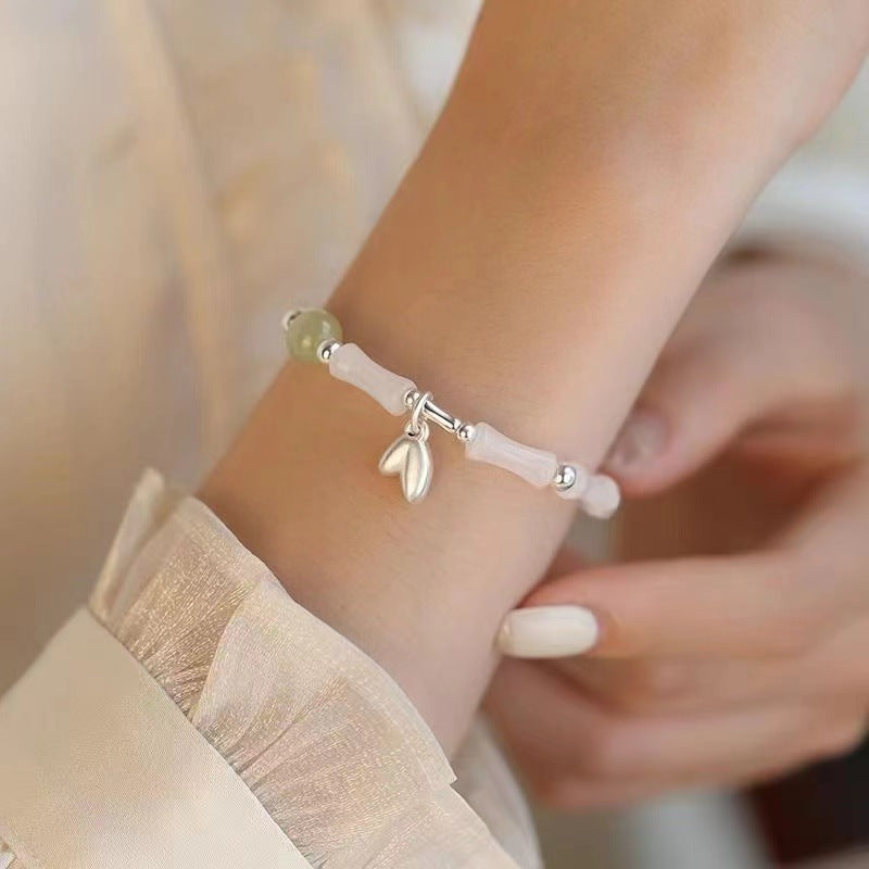 The Golden Ascent | Artisan Jade-Style Bamboo Bracelet with Prosperity Leaf Charm