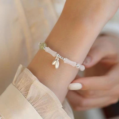 The Golden Ascent | Artisan Jade-Style Bamboo Bracelet with Prosperity Leaf Charm