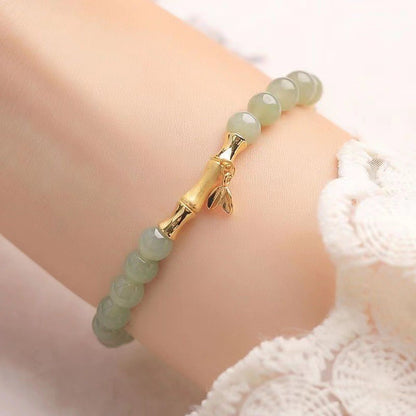 The Golden Ascent | Artisan Jade-Style Bamboo Bracelet with Prosperity Leaf Charm