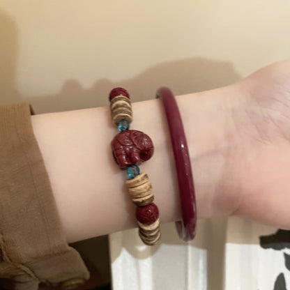 Earth & Ember Collection | Artisan Cinnabar Bangle & Hand-Carved Coconut Shell Pixiu Bracelet Set